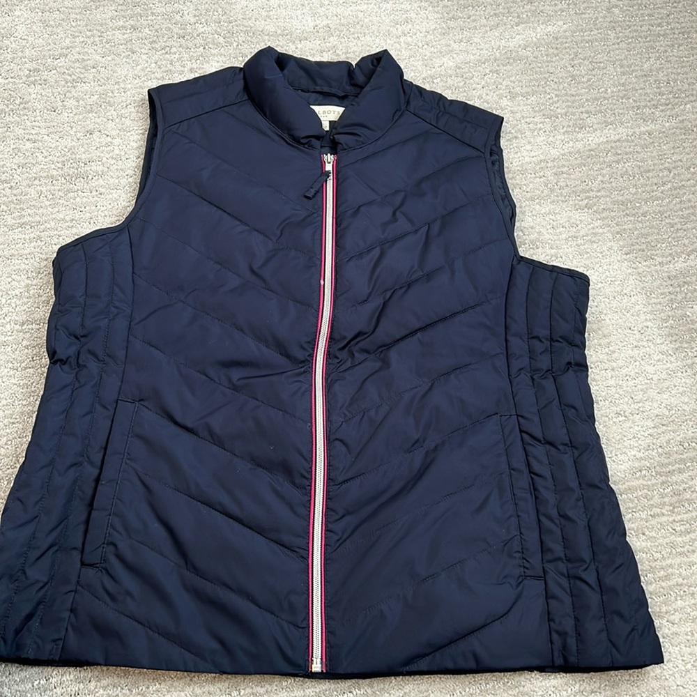 Navy blue lightweight vest.